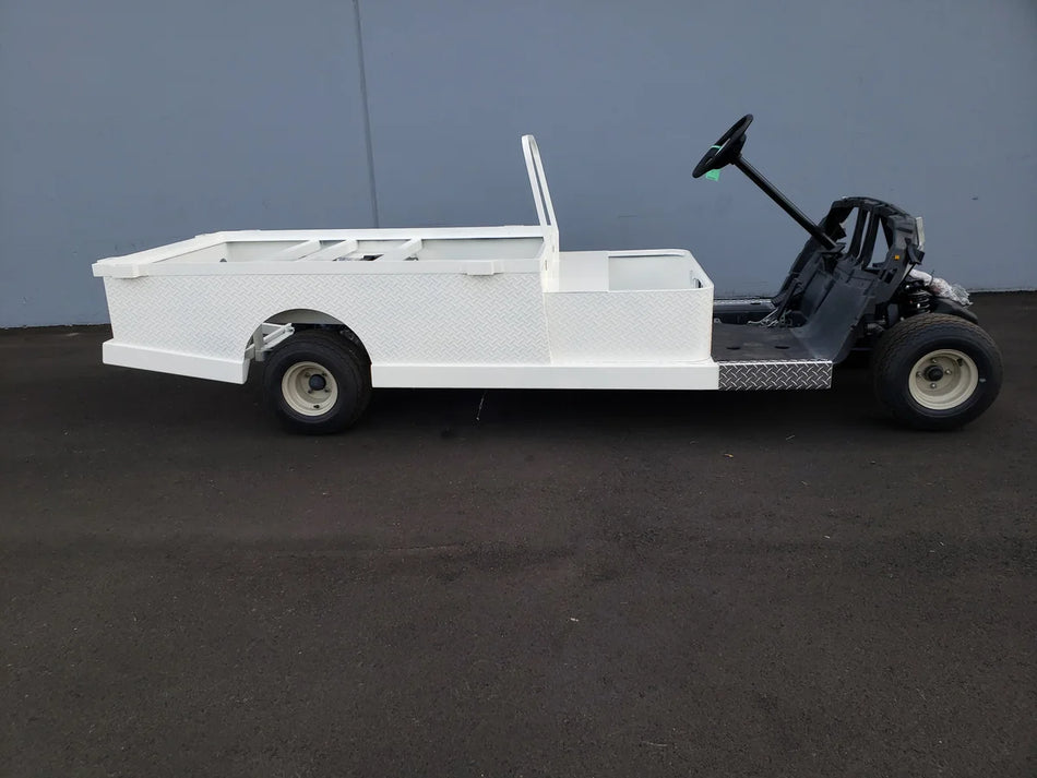 YAM-DRIVE-ST-FLAT-72 YAMAHA DRIVE CART STRETCH INTO STEEL 6′ FLATBED in white custom fabrication for golf carts designed for cargo and utility transport.