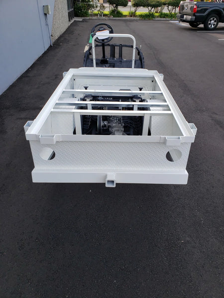 White metal frame mounted on a golf cart designed for flatbed deck conversion, highlighting the STAKEBED POCKETS FOR 6 FT FLATBED DECK CONVERSION with custom fabrication for golf carts.