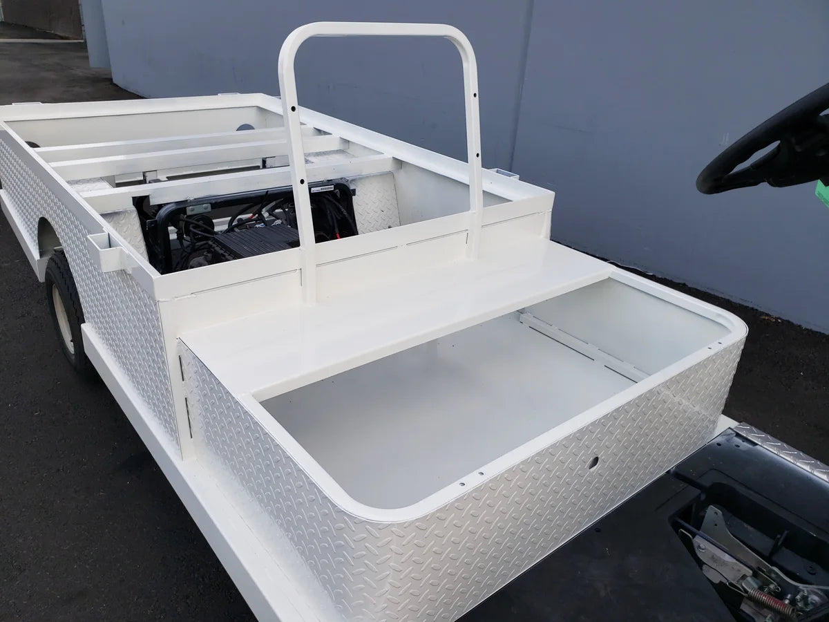 YAM-DRIVE-ST-FLAT-72 YAMAHA DRIVE CART STRETCH INTO STEEL 6′ FLATBED with custom fabrication for golf carts, featuring diamond plate steel flatbed and cargo storage area.
