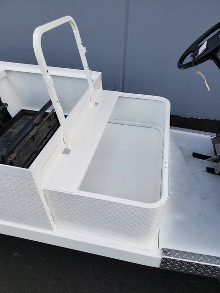 YAM-DRIVE-ST-FLAT-72 YAMAHA DRIVE CART STRETCH INTO STEEL 6′ FLATBED showcasing custom fabrication for golf carts with a white steel flatbed and diamond plate detailing.