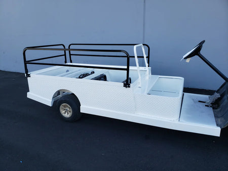 White flatbed golf cart with black metal stakebed pockets for 6 ft flatbed deck conversion, designed for custom fabrication for golf carts with utility and cargo capabilities.