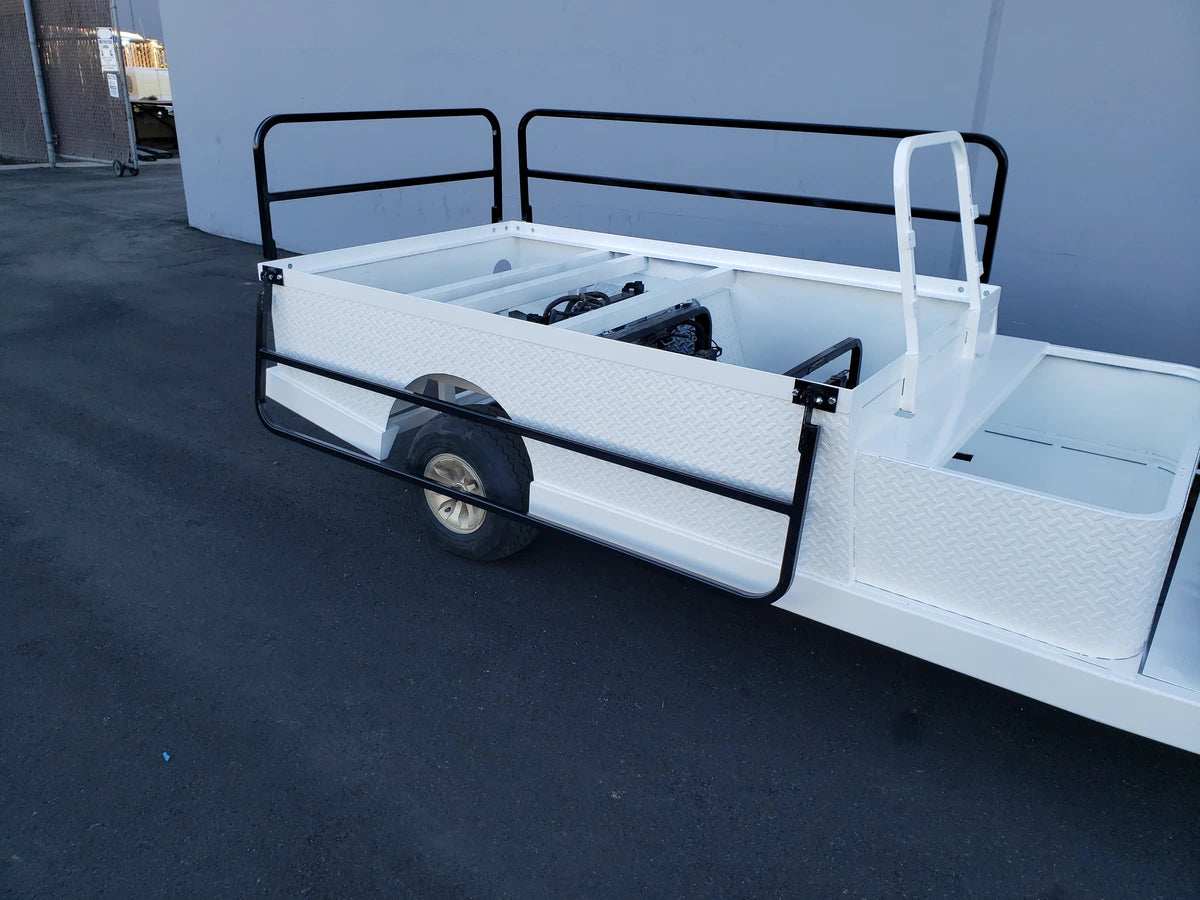 DROP RAILS 44″ X 72″ X 18″ FLATBED SIDE RAILS FOR 6 FT FLATBED CONVERSION installed on a white flatbed golf cart, featuring black metal rails for custom fabrication for golf carts and utility cargo.
