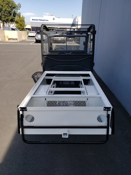 CUSH-800-ST-FLAT-72 CUSHMAN HAULER 800 CART STRETCHED INTO 6′ FLATBED showing a custom fabricated golf cart flatbed with metal framework and mesh cargo area for enhanced utility and cargo transport.