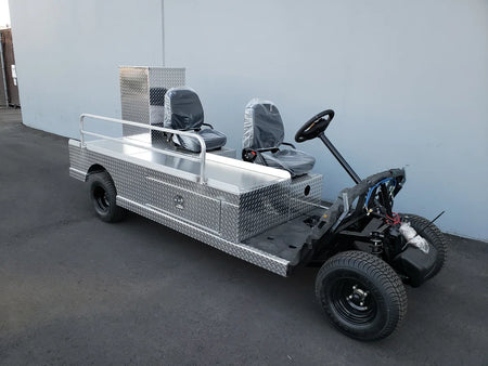 Custom fabricated YAM-AMB-96X23 AMBULANCE CART CONVERSION FOR YAMAHA GOLF CART with diamond plate metal body, dual seats, and utility rails for specialized transport and emergency use.