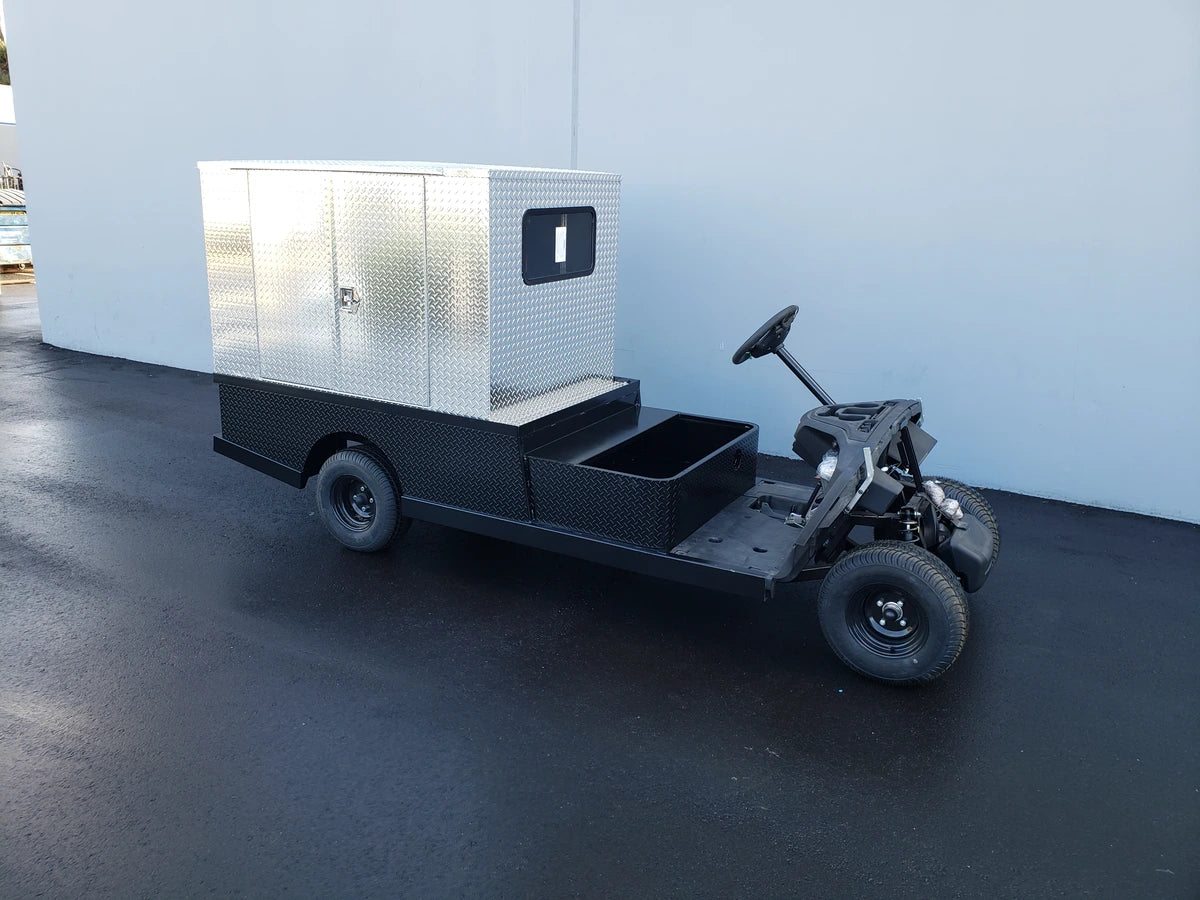 FMB-44X72X48-D-D2W2 FLATBED ALUMINUM DIAMOND PLATE MULTI-PURPOSE BOX 44″ WIDE X 72″ LONG X 48″ TALL WITH LOCKING DOORS mounted on a custom golf cart frame for specialized cargo and utility transport.