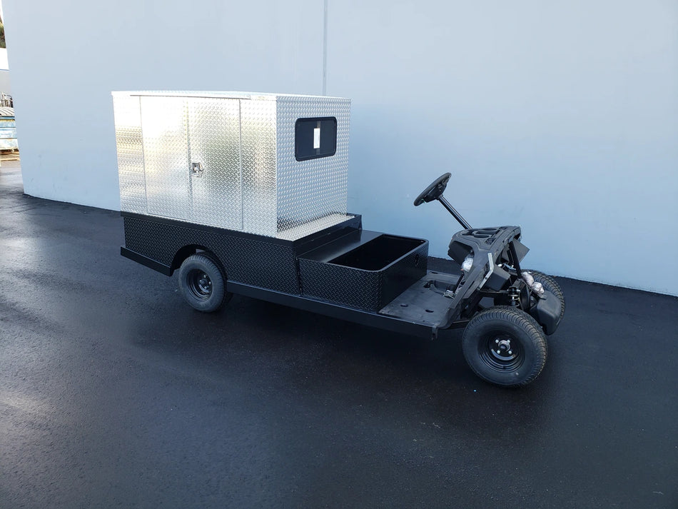 FMB-44X72X48-D-D2W2 FLATBED ALUMINUM DIAMOND PLATE MULTI-PURPOSE BOX 44″ WIDE X 72″ LONG X 48″ TALL WITH LOCKING DOORS mounted on a custom golf cart frame for specialized cargo and utility transport.