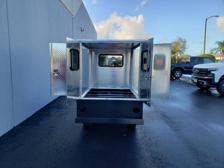 FMB-44X72X48-D-D2W2 FLATBED ALUMINUM DIAMOND PLATE MULTI-PURPOSE BOX 44″ WIDE X 72″ LONG X 48″ TALL WITH LOCKING DOORS open, showcasing interior space, designed for custom fabrication for golf carts.
