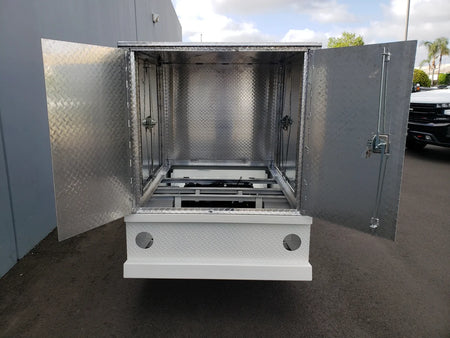 Open FMB-44X72X48-S-D3W0 FLATBED ALUMINUM SMOOTH MULTI-PURPOSE BOX 44″ WIDE X 72″ LONG X 48″ TALL WITH LOCKING DOORS showing diamond plate interior, designed for custom fabrication for golf carts.