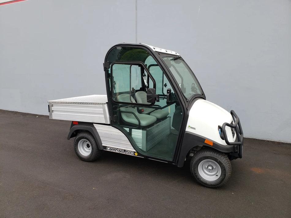White utility golf cart equipped with CC-510-UTILITYBOX-LID CLUB CAR 510 UTILITY BOX SOLID LOCKING LID RETROFIT on the cargo bed, designed for secure storage and transport.