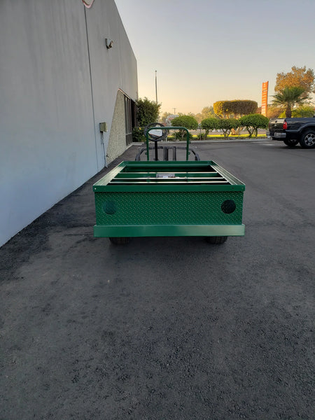 Green custom fabricated EZGO-TXT-ST-FLAT-72 6 FT FLATBED CONVERSION FOR EZ GO TXT designed as a specialty golf cart flatbed cargo utility platform.