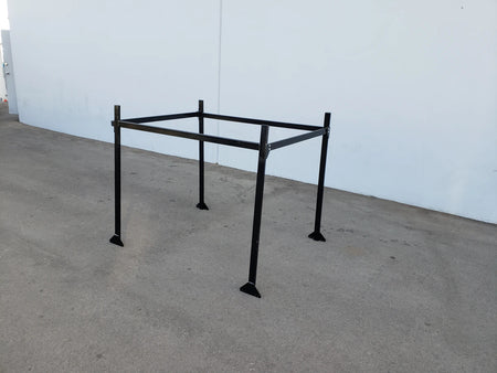 FB-45X72-TLR TOP MOUNT LADDER RACK FOR FLATBED in black metal, designed for custom fabrication on golf carts, shown standing on a concrete surface outdoors.