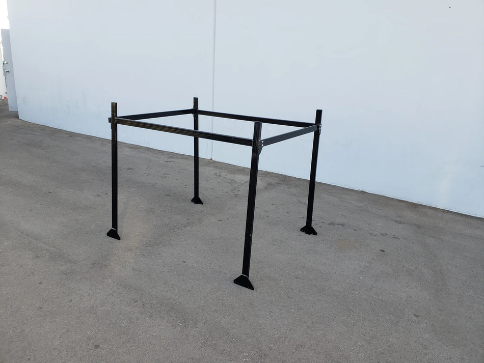 FB-45X72-TLR TOP MOUNT LADDER RACK FOR FLATBED in black metal, designed for custom fabrication on golf carts, shown standing on a concrete surface outdoors.
