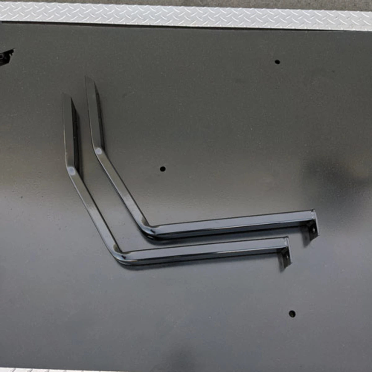 Custom-fabricated black metal brackets designed as part of the EZGO-RXV-PS6-4F+2B EZGO RXV 6 PASSENGER CONVERSION for golf carts.