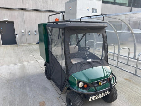Golf cart outfitted with EZGO-TXT14+VLRCHP-54LRA EZ GO TXT 2014 AND NEWER, VALOR, CUSHMAN HAULER PRO ALUMINUM LADDER RACK on roof, showcasing custom fabrication for golf carts.