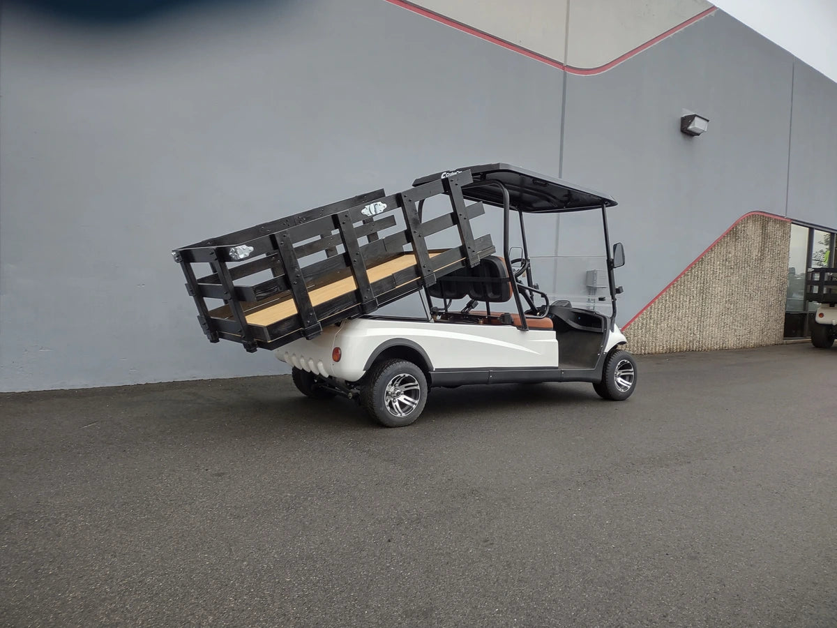 White golf cart equipped with a custom CRUISE-C20-DECK44X72-W WOOD FLATBED DECK featuring black wooden side rails, designed for utility and cargo transport.