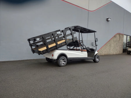 White golf cart equipped with a custom CRUISE-C20-DECK44X72-W WOOD FLATBED DECK featuring black wooden side rails, designed for utility and cargo transport.