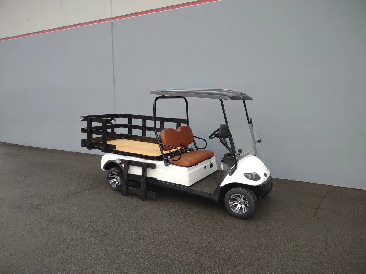 Golf cart with custom fabricated STAKE-SIDES-44X72X24 Flatbed Golf Cart Stake Sides installed on a flatbed for enhanced cargo utility and transport capacity.