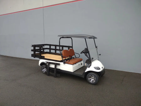 Golf cart with custom fabricated STAKE-SIDES-44X72X24 Flatbed Golf Cart Stake Sides installed on a flatbed for enhanced cargo utility and transport capacity.