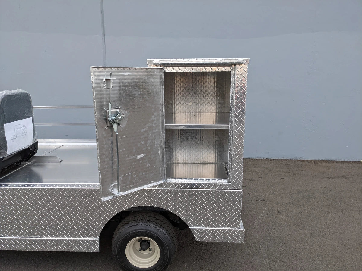 Open metal utility box with shelving on a custom fabrication for golf carts, part of the YAM-AMB-3SEAT-96X23 Ambulance Conversion for Yamaha Drive and Drive 2 Golf Cart.