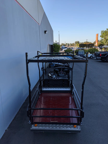 EVO-TURF-44X120-TLRI Top Mount Ladder Rack for mounting inside the bed of an Evolution Turfman 1000, custom fabricated for golf carts, shown installed on a golf cart flatbed with black metal framing.