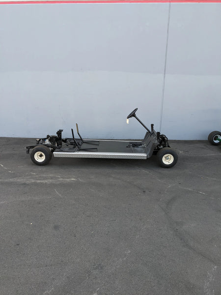 Chassis frame and steering assembly of EZGO-RXV-PS6-4F+2B EZGO RXV 6 PASSENGER CONVERSION showing custom fabrication designed for golf carts.