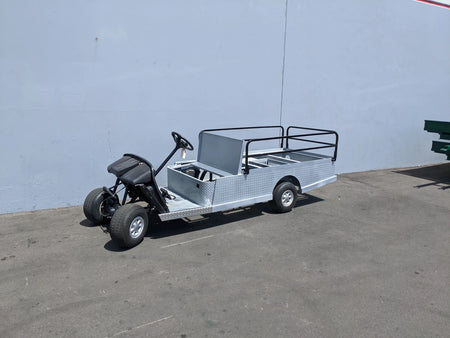 EZGO-TXT-ST-FLAT-72 6 FT FLATBED CONVERSION FOR EZ GO TXT golf cart featuring custom fabrication with a durable flatbed, utility cargo area, and reinforced rails for versatility and heavy-duty use.