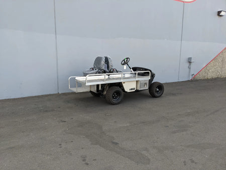 EZGO-EMT-84X24 EMT GOLF CART BED CONVERSION FOR EZ GO TXT GOLF CART showing a custom fabricated flatbed with rails and utility features designed for specialized cargo and medical transport use.