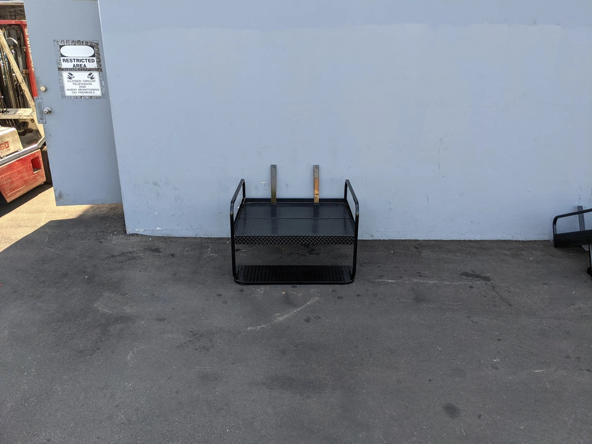 EZGO-TXT-SB-COMBO EZ GO TXT FLIP OVER SEAT/BOX COMBO black metal cargo box designed for custom fabrication for golf carts, featuring a sturdy flatbed with side handles for utility and storage.