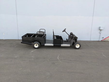 EZGO-RXV-ST-FLAT-CONV-72 EZ GO RXV FLATBED RETROFIT WITH CONVERTIBLE SEAT custom fabrication golf cart with black metal flatbed and convertible seat for cargo and utility use.