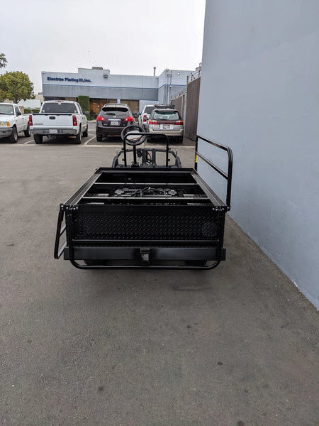 A black custom-fabricated flatbed conversion for golf carts, showing the rear storage and framework of the YAM-DRIVE2-ST-FLAT-72 YAMAHA DRIVE 2 6FT FLATBED CONVERSION.