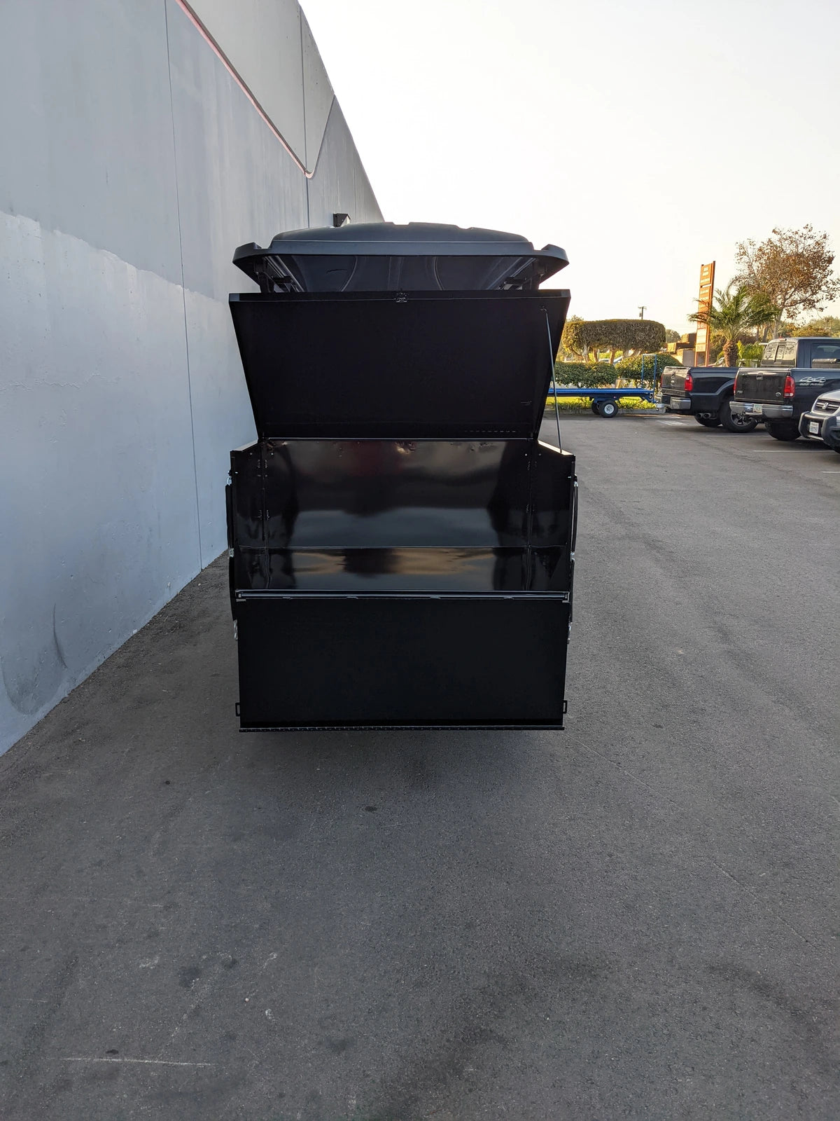 Black heavy-duty open EVO-CLASSIC-CARGO31 EVOLUTION CLASSIC LOCKING CARGO BOX designed with custom fabrication for golf carts, suitable for storing cargo and utility equipment.