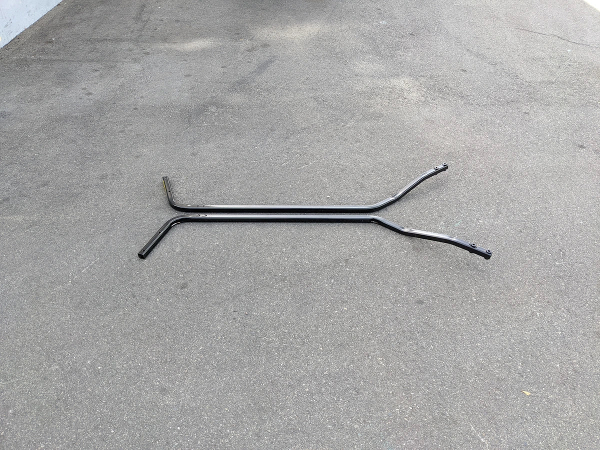 CC-ONWARD-FTS CLUB CAR ONWARD FRONT TOP SUPPORT shown as a black metal frame piece designed for front top support on golf carts, placed on a concrete surface.