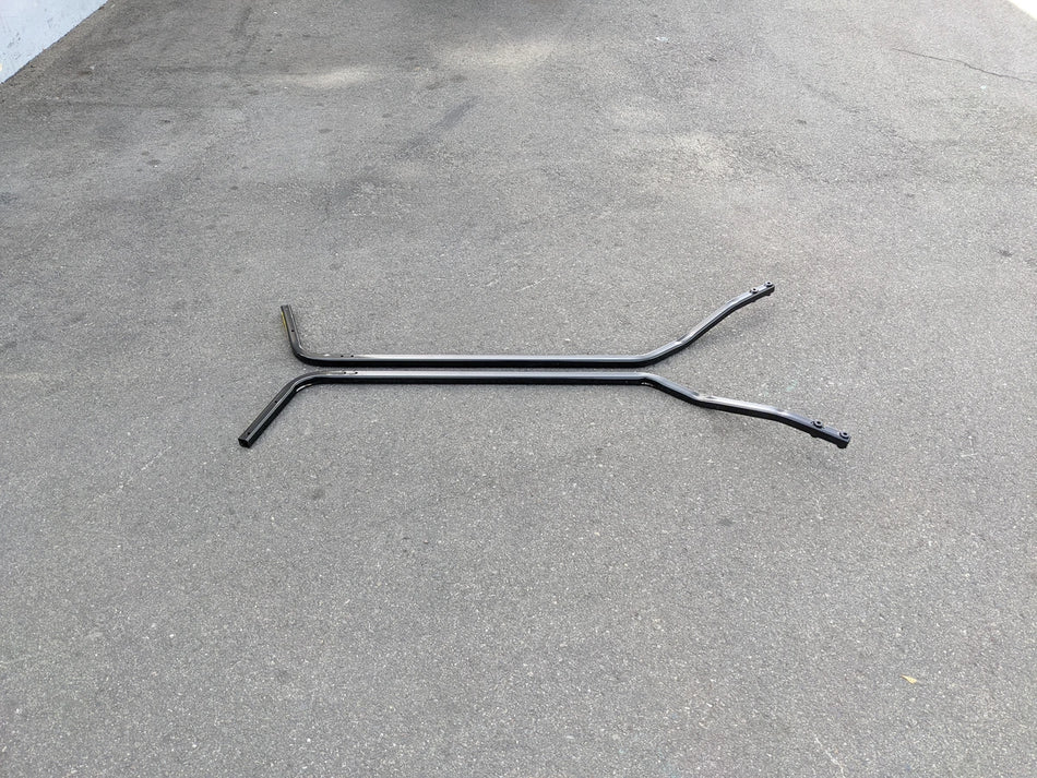CC-ONWARD-FTS CLUB CAR ONWARD FRONT TOP SUPPORT shown as a black metal frame piece designed for front top support on golf carts, placed on a concrete surface.