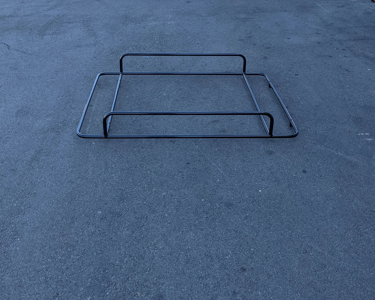 EZGO-TXT14+VLRCHP-54LRA EZ GO TXT 2014 AND NEWER, VALOR, CUSHMAN HAULER PRO ALUMINUM LADDER RACK shown on pavement, designed for custom fabrication for golf carts.