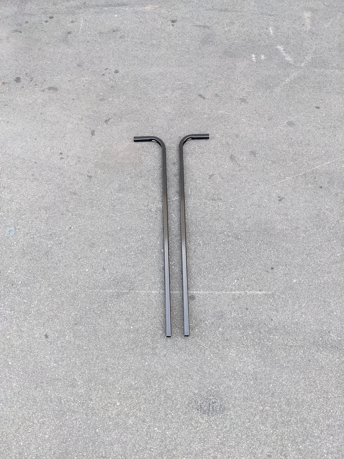 CART-RTS GENERIC GOLF CART REAR TOP SUPPORT consisting of two black metal rods with bent ends, designed for securing rear top structures on golf carts.