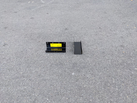 CC-ON+PREC-CANOPY BRACKET SET CLUB CAR ONWARD AND PRECEDENT SHADE TOP CANOPY BRACKET SET showing two black metal mounting brackets on pavement for golf cart accessories.
