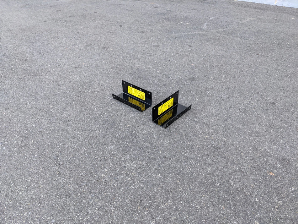 CC-ON+PREC-CANOPY BRACKET SET CLUB CAR ONWARD AND PRECEDENT SHADE TOP CANOPY BRACKET SET displayed on asphalt surface, showing black metal construction with yellow labels.