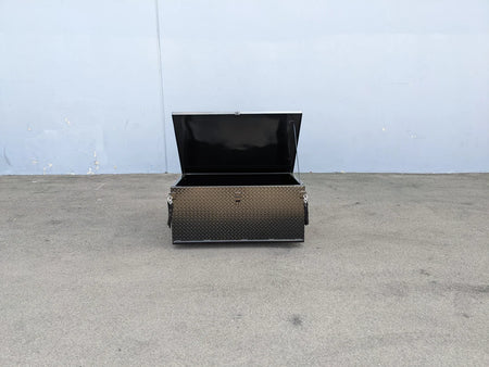 Black metal locking cargo box with diamond plate pattern, open lid showing interior, designed as custom fabrication for golf carts, YAM-DRIVE-CARGO31 YAMAHA DRIVE LOCKING CARGO BOX.