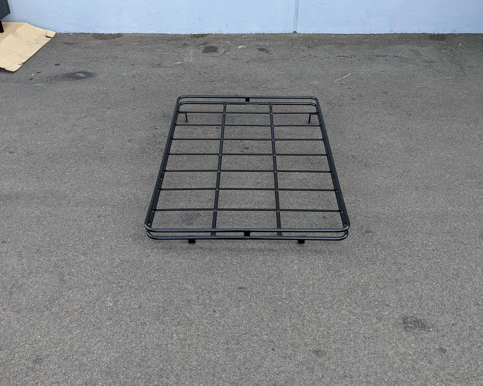 Black metal EZGO-LIBERTY-64RR3 EZ GO LIBERTY ROOF RACK designed for custom fabrication on golf carts, featuring durable bars for cargo and utility carrying capacity.