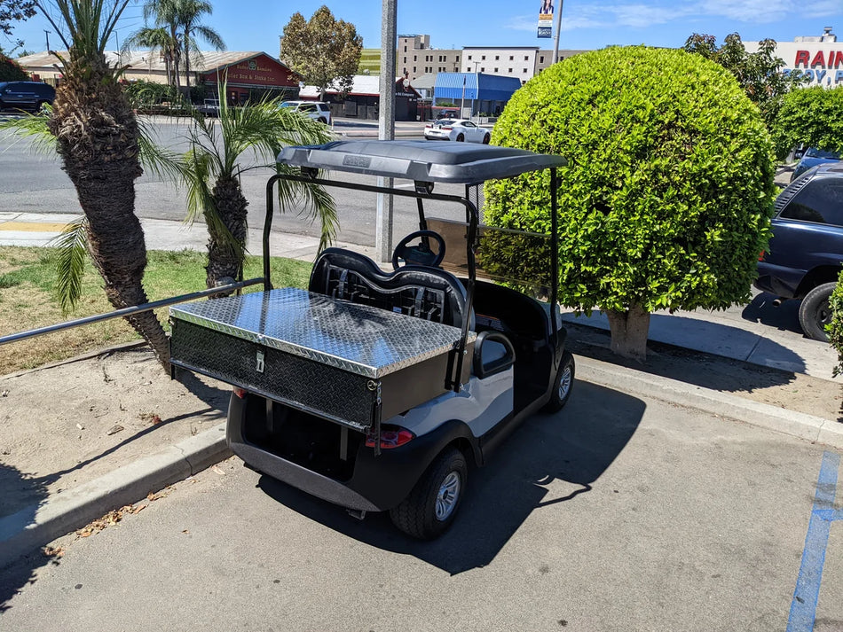 UTILITY31-LID RETROFIT LOCKING LID FOR CART HAULERS UTILITY BOXES installed on the back of a golf cart, showcasing custom fabrication for golf carts with a secure metal locking lid.