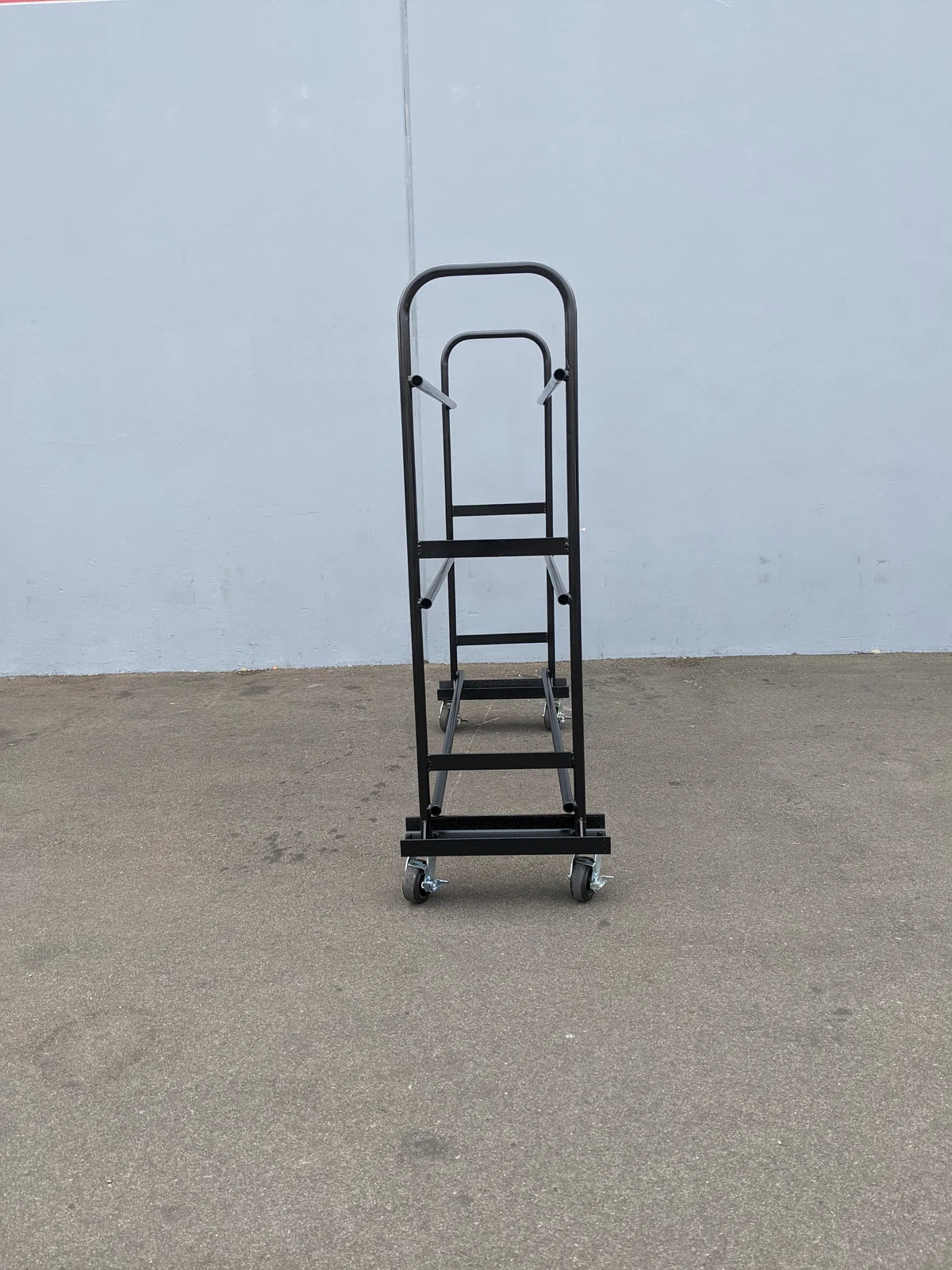 TR-GC1624-24X72 Tire Rack custom fabrication for golf carts, black metal frame rack with multiple levels and caster wheels for mobility, designed for storing and transporting tires.