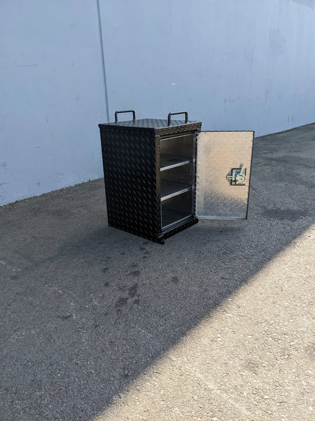 TB-15.5X16X20 LOCKING STORAGE BOX with handles shown open, featuring diamond plate metal construction and shelves, designed for custom fabrication for golf carts.