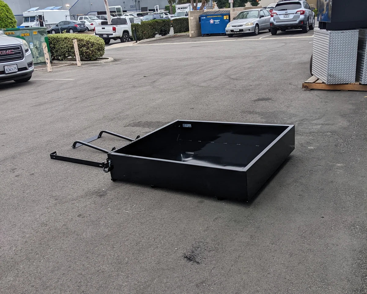 TOM-E2-UTIL48 TOMBERLIN EMERGE 2 Utility Box 48″ long flat black metal utility box with hitch attachment, designed for custom fabrication for golf carts and cargo hauling.