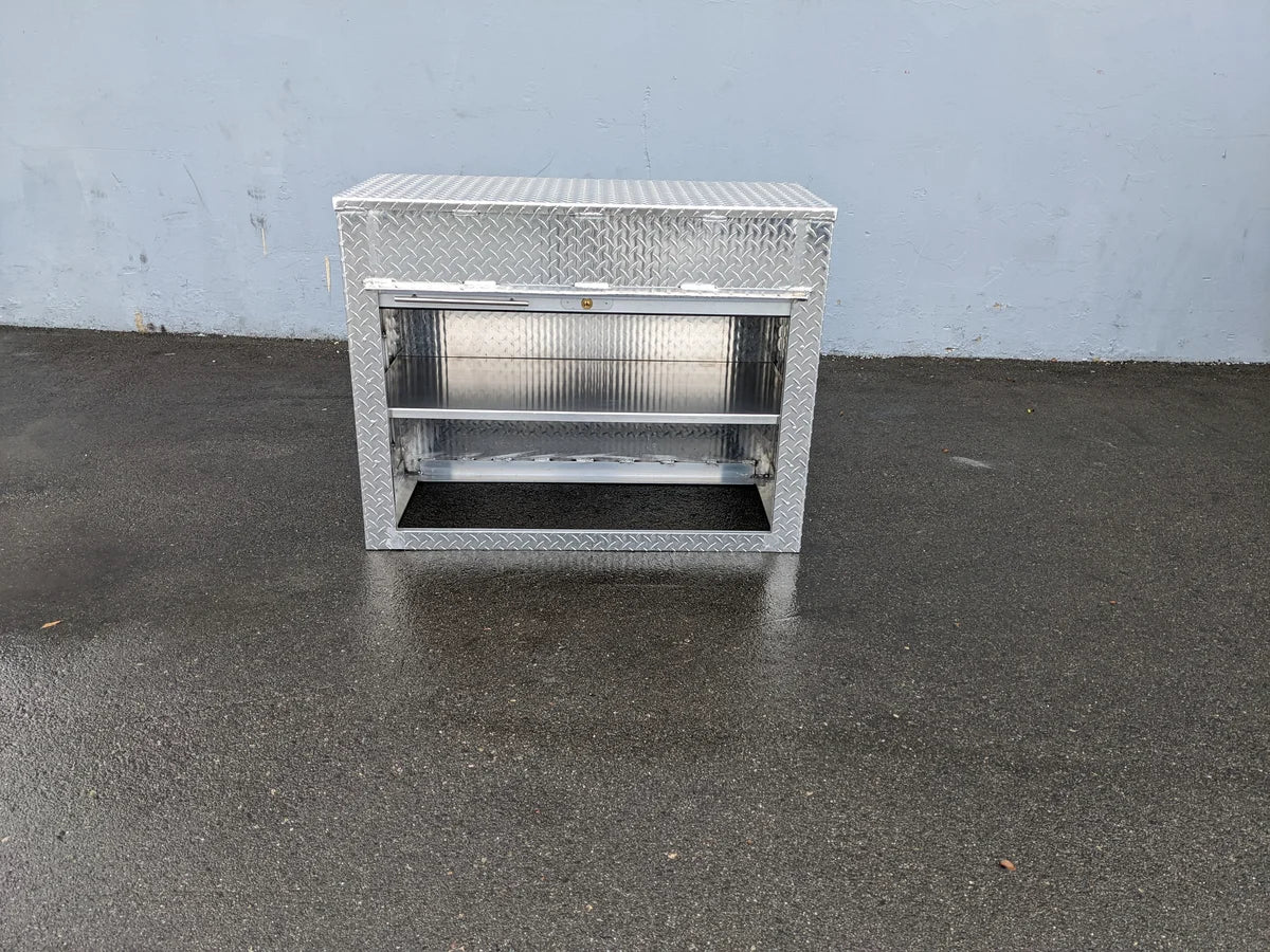 Heavy-duty metal toolbox with roll-up door and shelving, designed for bed mounting, featuring diamond plate finish, ideal for custom fabrication for golf carts, TB-44X20X30 ROLL-UP DOOR TOOLBOX STORAGE CABINET BED MOUNT.