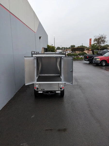 FMB-GEM-52X70X48-S-D3W0 ROLL UP DOORS FLATBED ALUMINUM SMOOTH MULTI-PURPOSE BOX FOR GEM ELXD 52 WIDE X 70 LONG X 48 TALL open rear view showing spacious cargo area, custom fabrication for golf carts.