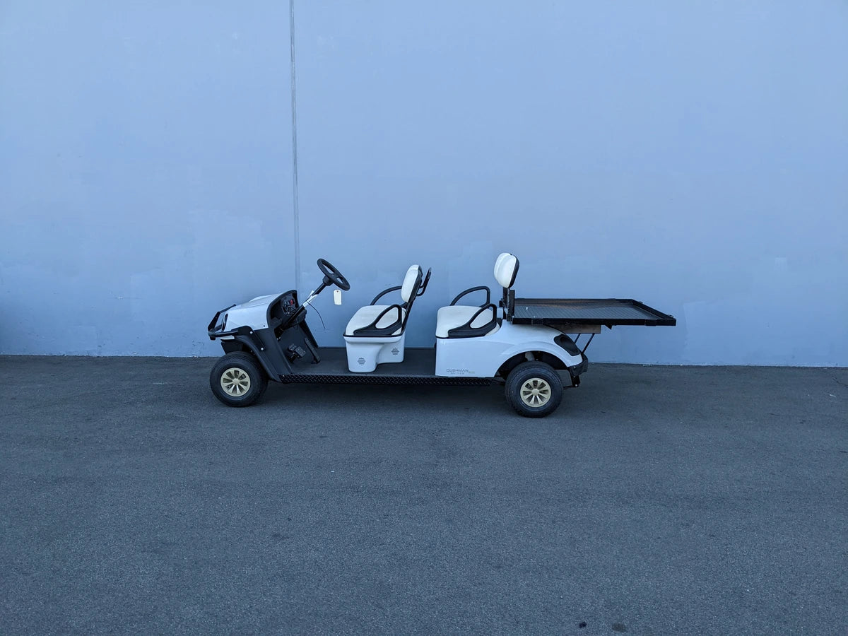 CUSH-SHUTTLE-DECK48X48-SP CUSHMAN SHUTTLE CARGO DECK WITH STAKE POCKETS installed on an extended golf cart designed for custom fabrication and utility cargo transport.