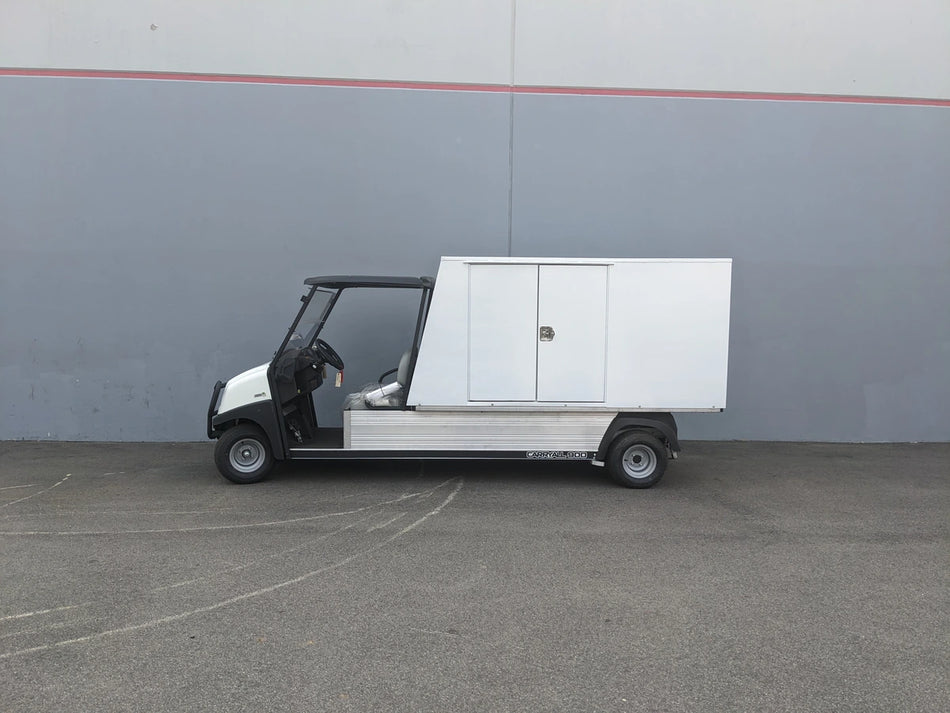A utility flatbed cart equipped with the CC-CARRYALL900-LAUNDRY BOX FLATBED SPECIFIC PURPOSE BOX FOR CARRYALL 900 WITH LOCKING DOORS, SHELVES, AND HANGING ROD, designed for secure cargo and storage.