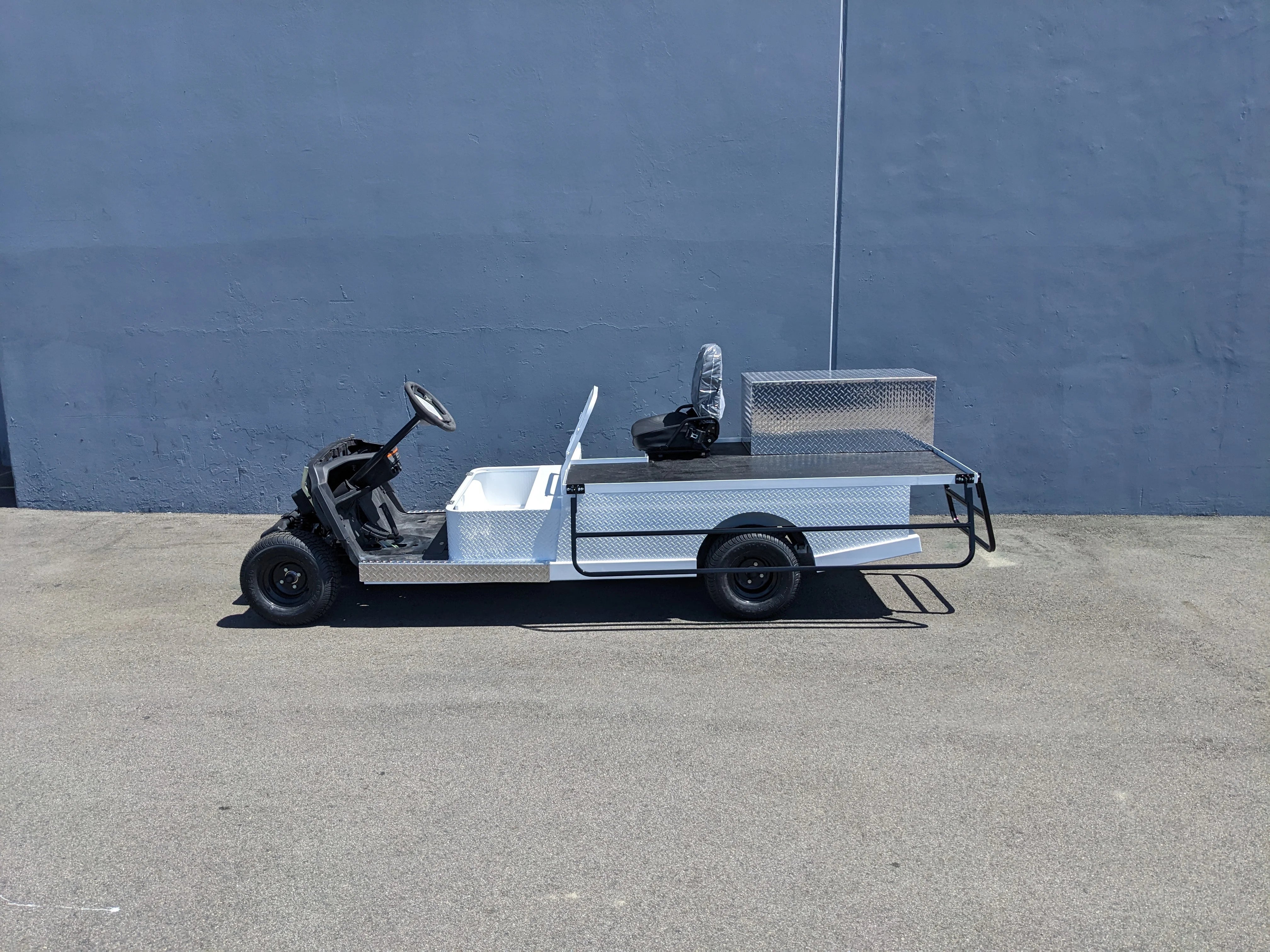 YAM-AMB-2SEAT-ST-FLAT-84 2Seat Ambulance Conversion on Yamaha Flatbed showing a custom fabricated flatbed and utility box designed for specialty golf cart beds and ambulance use.