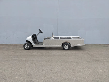 EZGO-TXT-AL-FLAT-72 6 FOOT ALUMINUM BED FLATBED CONVERSION installed on a golf cart, showcasing custom fabrication for golf carts with a durable flatbed for utility cargo transport.