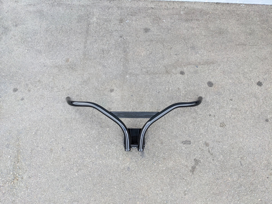 CRUISE-C40-BG CRUISE CAR/ICO C40 BRUSH GUARD, a custom fabricated black metal brush guard designed for golf carts, shown on concrete surface.